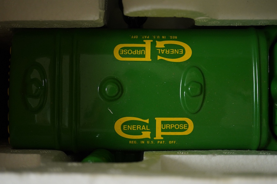 A boxed Enesco collectible cookie jar (biscuit barrel) in the form of a John Deere tractor